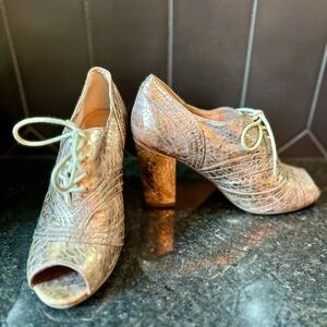 Seychelles dressy open toe tie up metallic.  Like new, worn once. Near perfect.